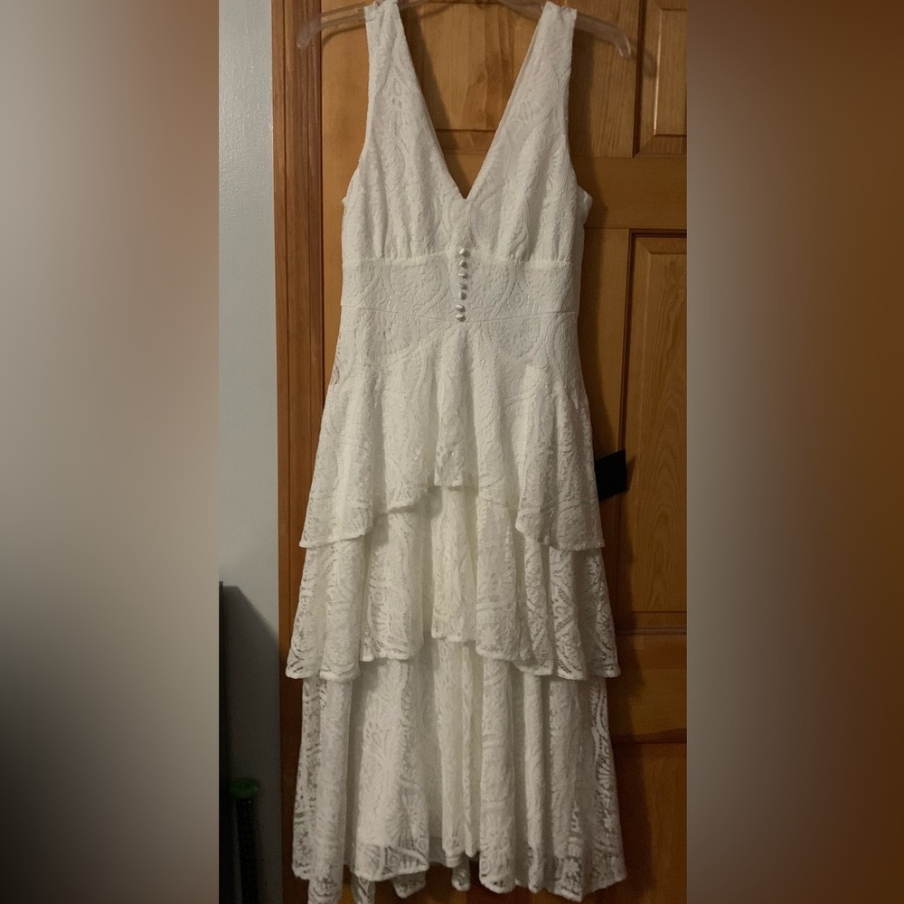 Lulu’s ruffle dress. Mid calf length.